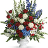 A dazzling display of patriotic red, white and blue flowers sends a