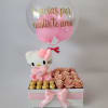 Caja elaborada con ferreros, rosas rosadas, mini hello kitty, y un globo
