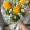 3 yellow roses with fragrant chamomile stems 