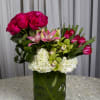 Trendy moms will adore this cascade of bright roses, hydrangeas, tulips, lilies