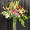 Sweet Romance Vase Arrangement
Celebrate love with this charming mix of red roses