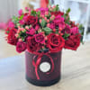 This luxurious arrangement is a bold celebration of romance, charm, and sophistication.