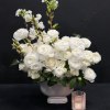 White Ranunculus, Blossoms, Roses, Camelia leaf in a white ceramic