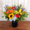 Vibrant primary colors arrive in a cobalt blue vase- sure to perk