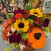 This pumpkin is sure to please! Send your special someone fall flowers