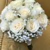12 creamy roses and baby&#039;s breath. 