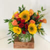 This floral design evokes a fall feeling, but with all of the