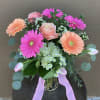 Beautiful vase of hydrangea, Gerbera daisies,  roses and tulips in a