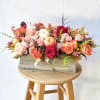 The Autumn Centerpiece is an impressive display of stunning fall colors and