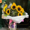 Bright, colorful flowers that radiate joy and positivity. 
This cheerful arrangement is