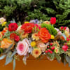 A beautiful, long centerpeice in elegant seasonal style, decorated front and back.