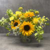 A beautiful, seasonal mixture of cheerful yellow flowers featuring sunflowers. Created to