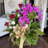 Roses, orchids, and two peace plants