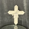 A white wooden cross for a boy