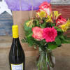 One bottle of wine with a Designer&#039;s Choice Bouquet to match. Let