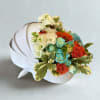 Celebrate the arrival of your baby with this tender arrangement in shades