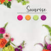 Our talented designers will use premium flowers in a bold sunrise color