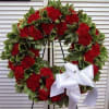 A beautiful tribute to a loss loved one made of red carnations