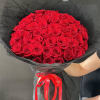 This Hand-Tied 50 Stem Rose Bouquet is a stunning display of elegance
