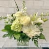 This lovely bouquet delivers an oasis of beauty and elegance. Soothing, serene