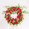 Beautiful greened-in wreath with Red flowers, or in a different color of