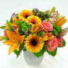 Orange lilies, coral roses, yellow gerberas