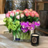  A simple yet fun mix of tulips, orchids and viburnum, brings