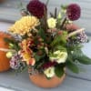 Celebrate the season with a handcrafted fall arrangement designed in an 8&quot;