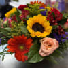 We design the freshest gerber, roses and sunflowers in a contemporary vase