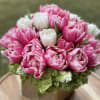 A mix of double tulips with a base of hydrangea