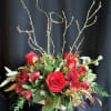 Unique holiday centerpiece in an elegant silk paper box. Winter evergreens, red