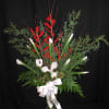 Plump red Ilex berry branches and stark white iris make for a