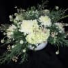 Rustic elegant and inspiring! This stunning all white / ivory centerpiece will