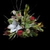 Beautiful designed seasonal mix of exquisite fresh cut and artificial flowers