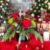 Beautiful seasonal design made with fresh Christmas greens and roses. Very decorative