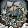 Artificial wreath with ornaments, decorations and a ribbon