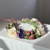 Softly romantic and full of whimsy, this flower crown is a wearable