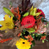 You can smell the garden! Designers choice of autumn colored garden flowers
