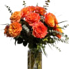 An exquisite bouquet featuring 24 vibrant, coral/apricot roses that evoke the warm