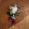 Keep the good vibes going with this fresh and fun boutonniere &mdash;