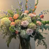 A graceful expression of remembrance, the Tranquil Memories Bouquet blends soft blush