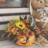Spooky ceramic pumpkin with fall flowers - can be used as a