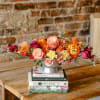 Celebrate October holidays with vibrant gold marigolds, contrasted with rich wine roses
