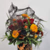 Select this spooky yet beautiful 360&deg; arrangement filled with halloween decor and
