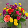 Bursting with color and personality, this cheerful bouquet radiates warmth and joy.