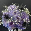 A cute and spooky arrangement meant to look like a starry night