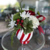 Sweet, simple, and oh-so festive &mdash; our Peppermint Kisses arrangement captures the