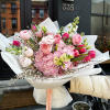 A medium-sized bouquet made with seasonal flowers that are available in our