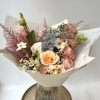 A medium-sized bouquet made with seasonal flowers that are available in our
