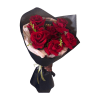 A bouquet of deep red French roses with fresh greenery. Chic, strong